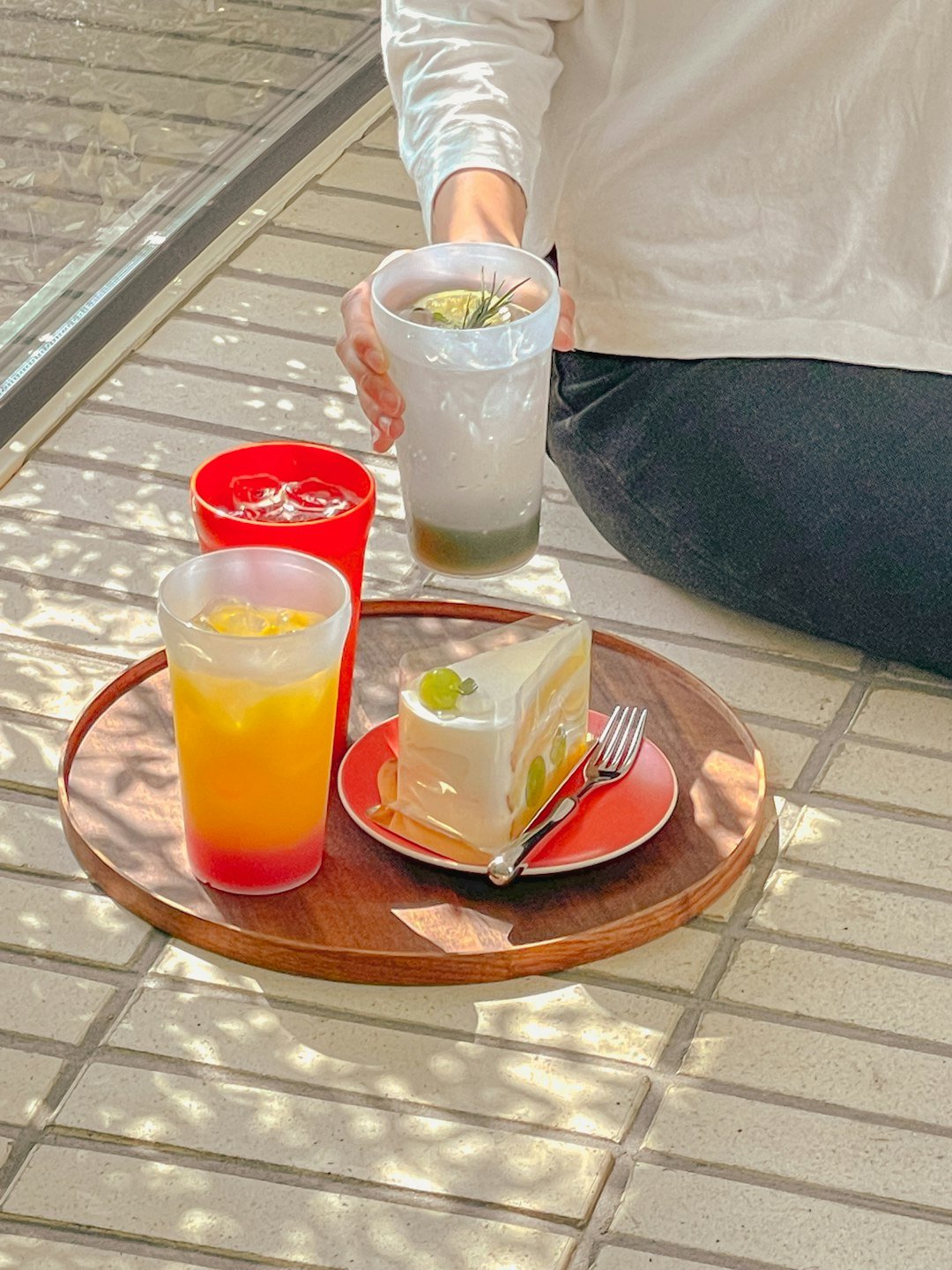 a-person-sitting-at-a-table-with-a-plate-of-food-g8t0426bsq4